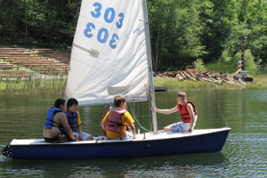 Scouts learning from experience how to sail.